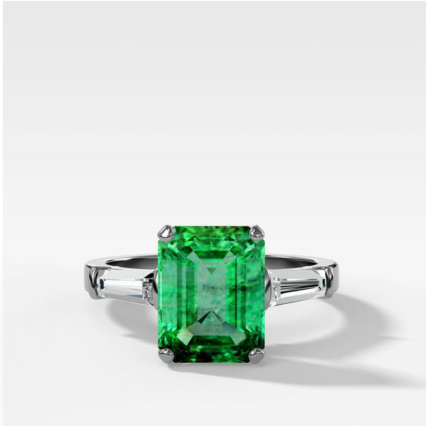 Emerald Cut Emerald Translunar Ring With Tapered Baguette Diamond Side 