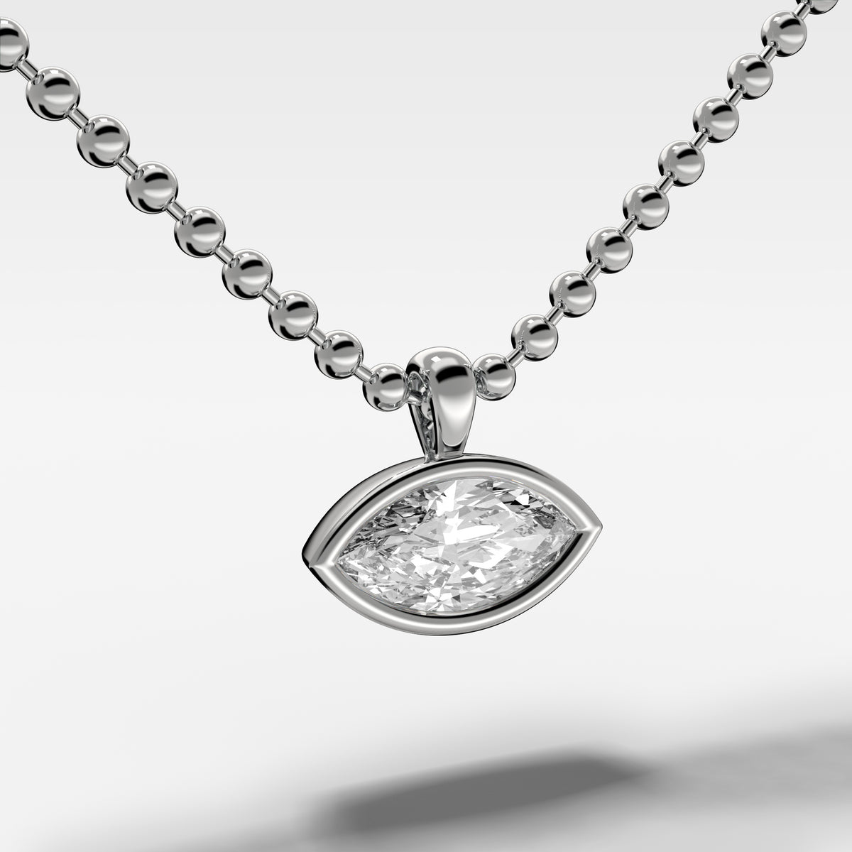 Bezel Set Pendant Beaded Necklace with East West Marquise Cut Diamond