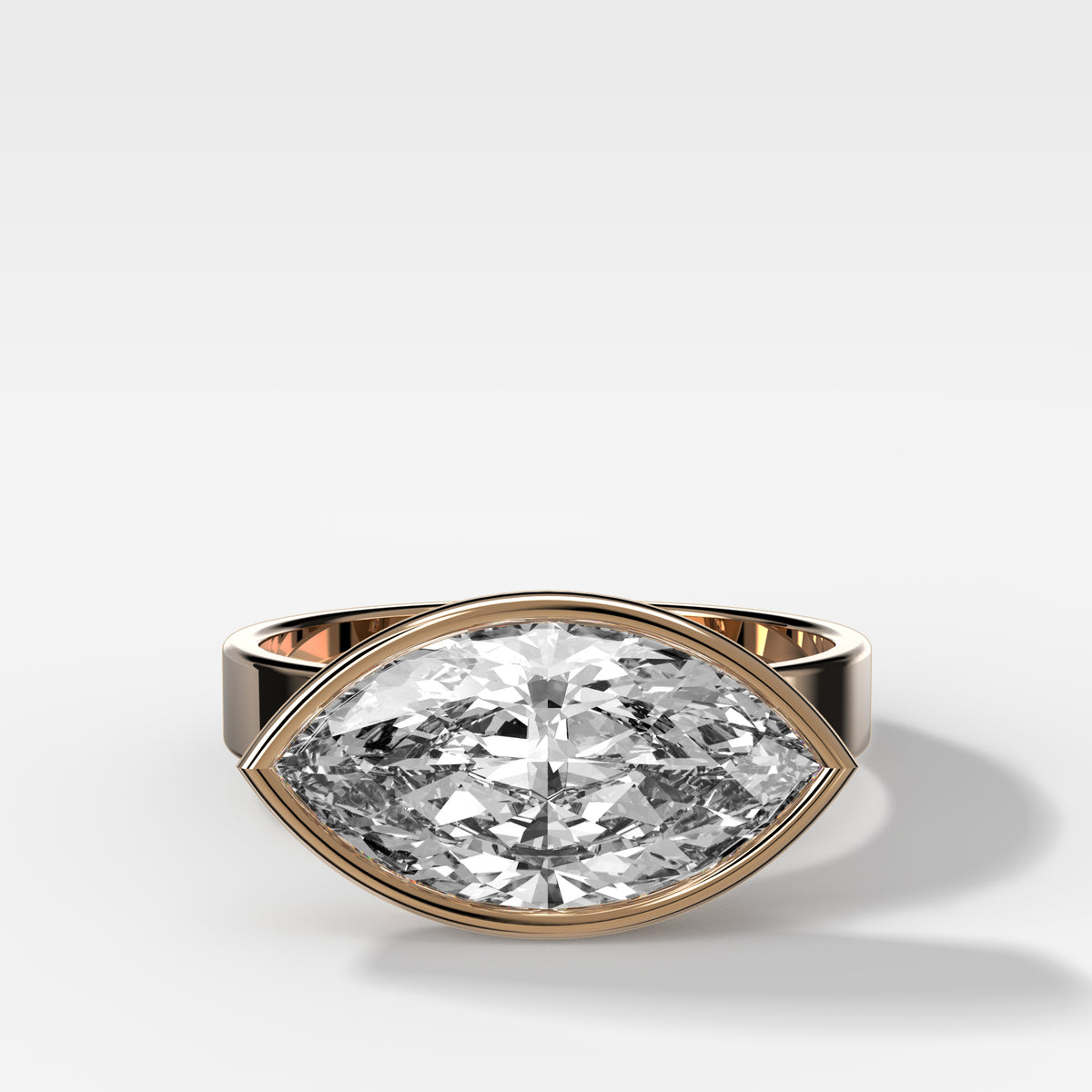 Finest Bezel Set Engagement Ring With East West Marquise Cut Diamond