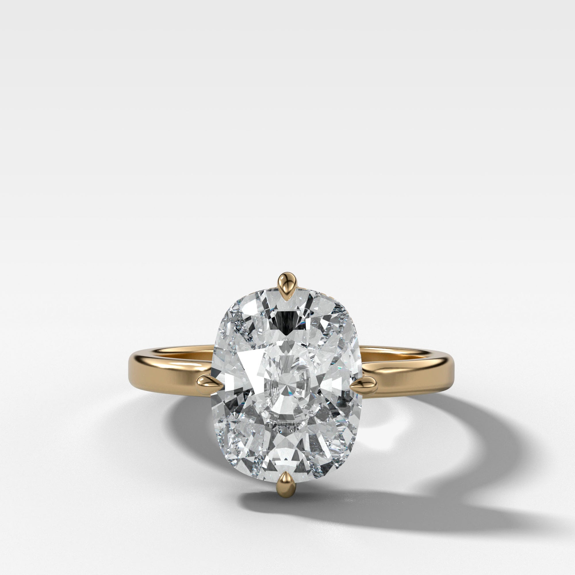 Compass Solitaire Engagement Ring with Elongated Cushion Cut Diamond