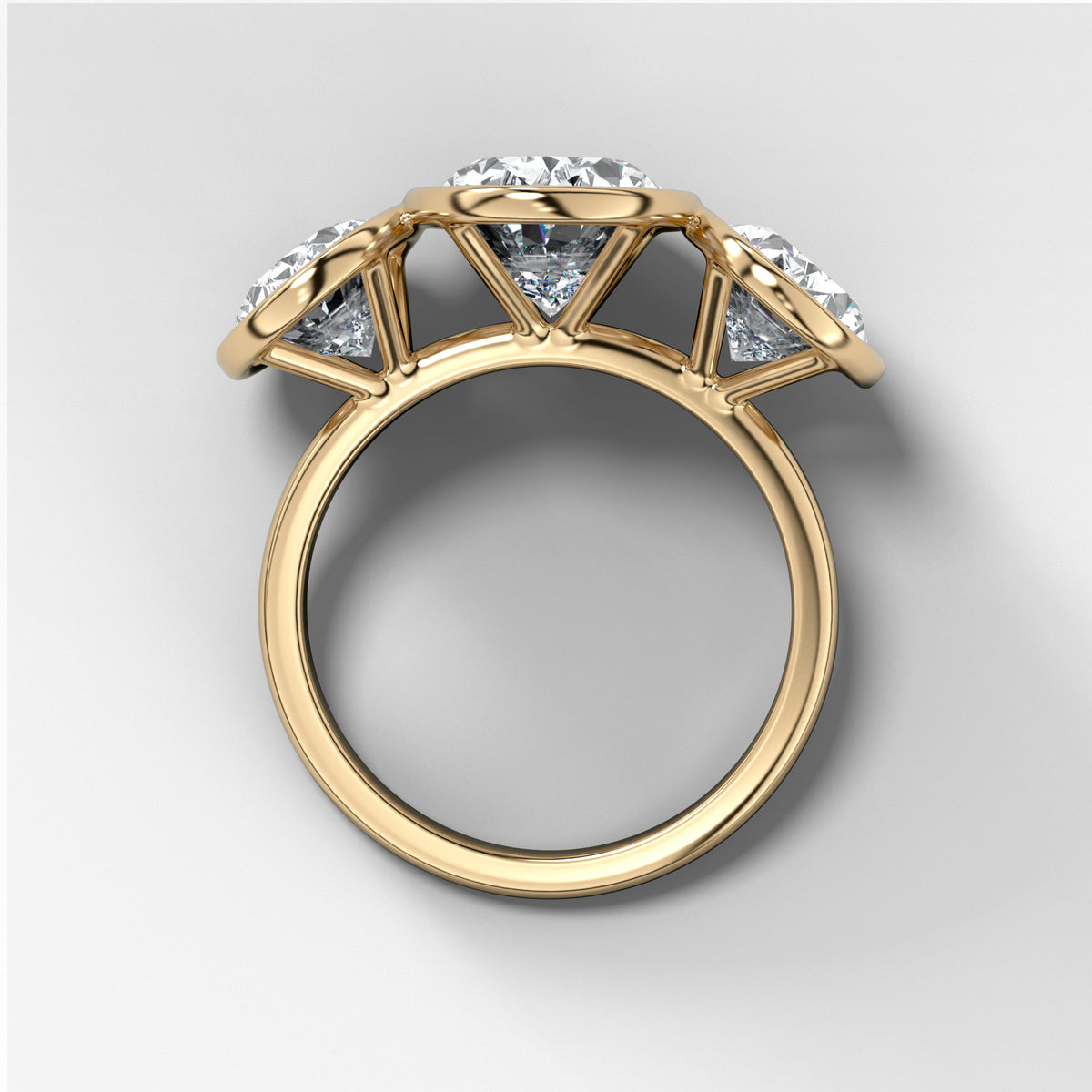 Penumbra Bezel Triad Engagement Ring With Oval Cut Diamonds