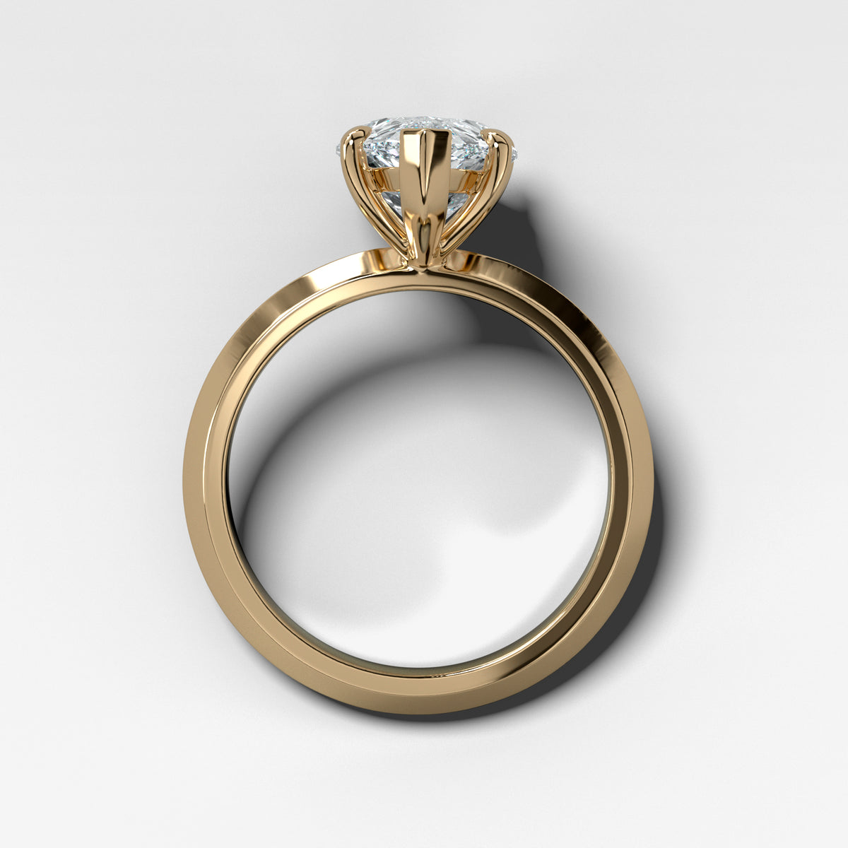 Butter Knife Solitaire Engagement Ring With Pear Cut Diamond