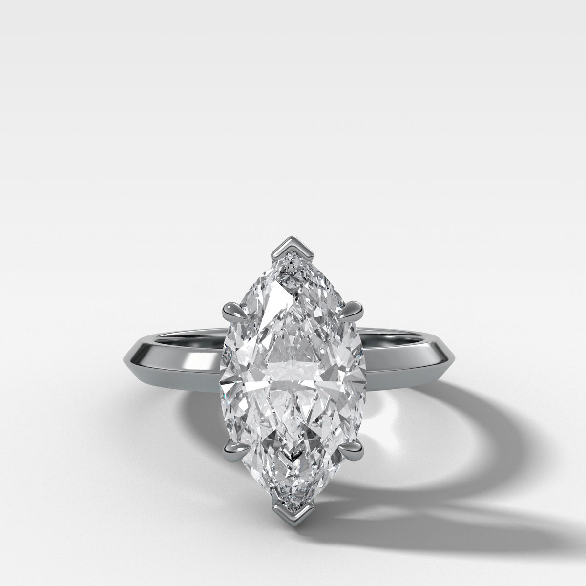 Butter Knife Solitaire Engagement Ring With Marquise Cut Diamond