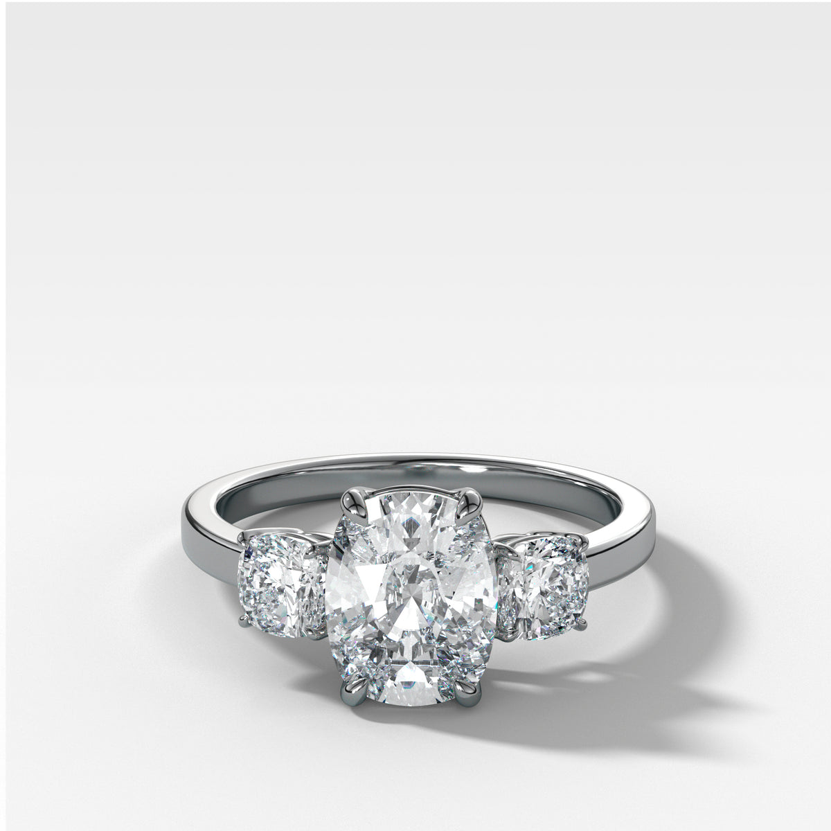 Three Stone Engagement Ring With Mixed Cushion Cut Diamonds