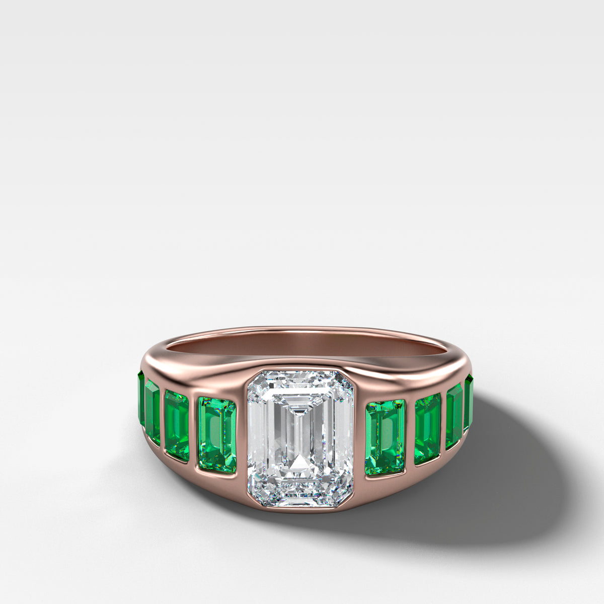 Brick Road Engagement Ring with Green Emeralds and an Emerald Cut