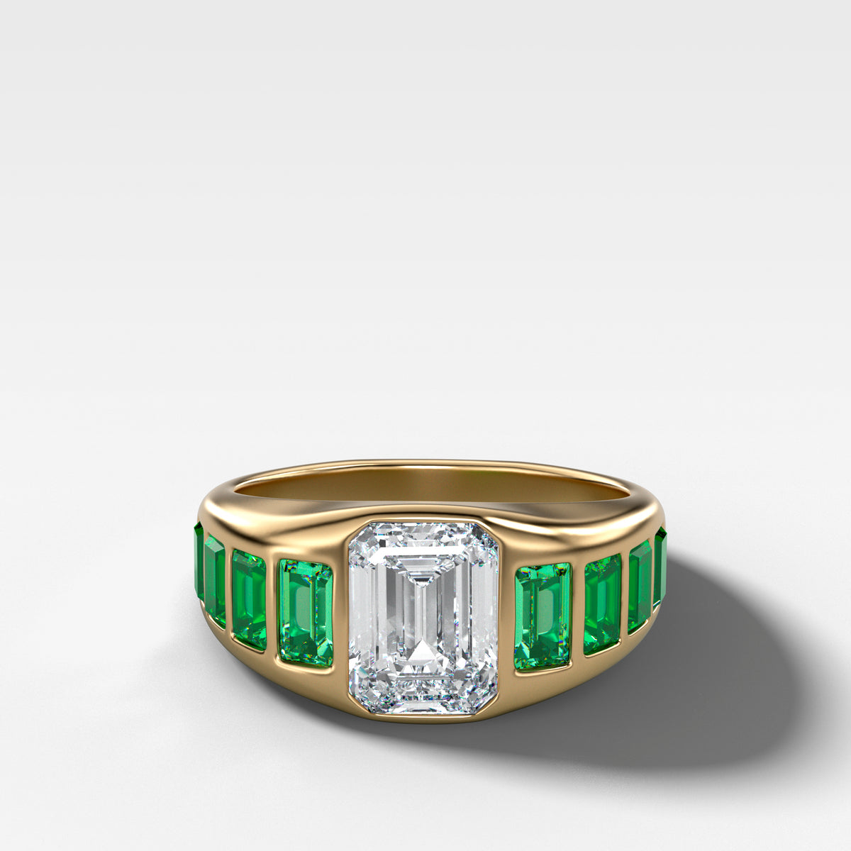 Brick Road Engagement Ring with Green Emeralds and an Emerald Cut