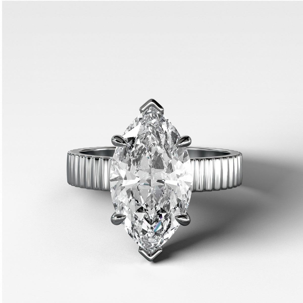 Finest Ridged Solitaire Engagement Ring With Marquise Cut Diamond