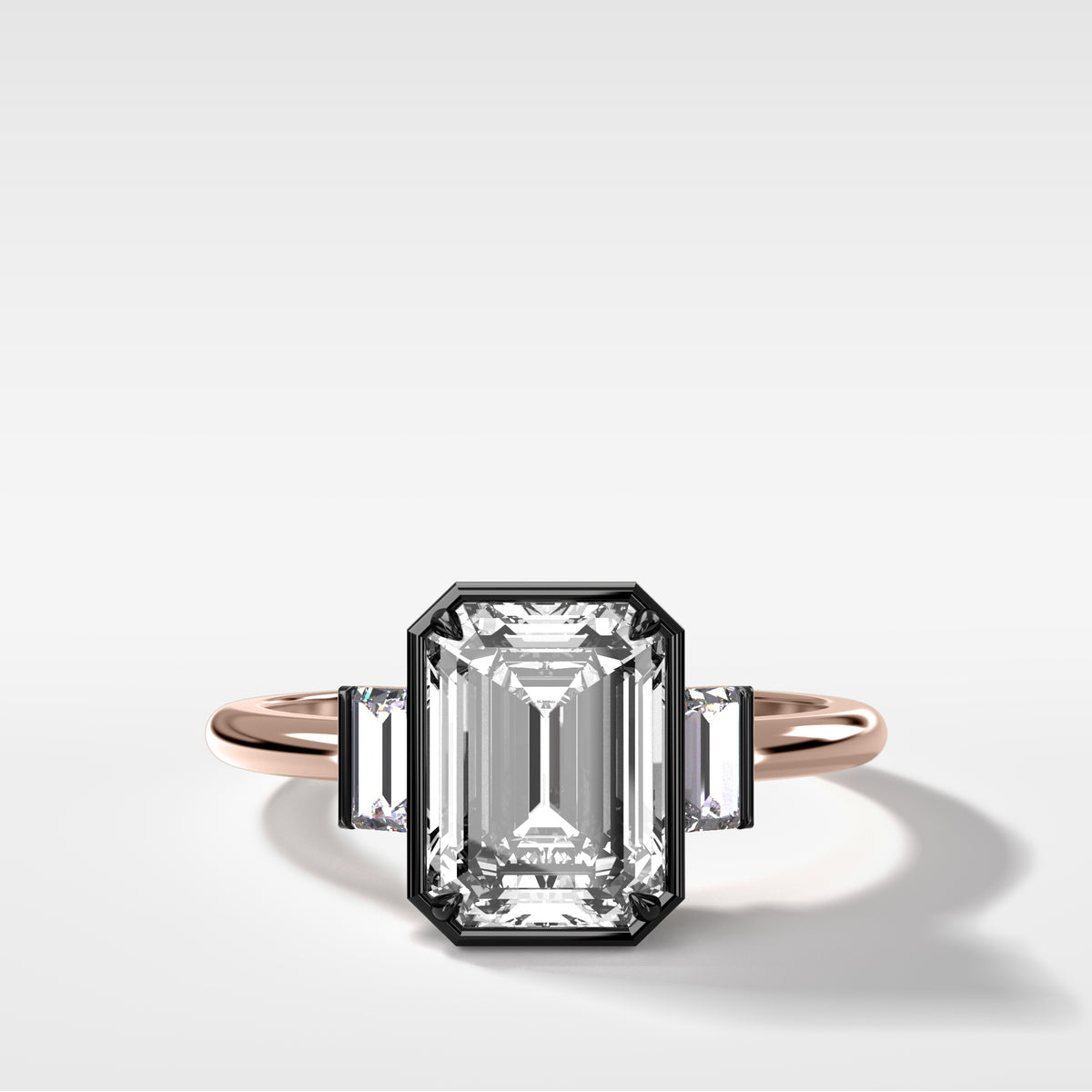 Blackened Three Stone Engagement Ring With Straight Baguette Side Stones and Emerald Cut Diamond