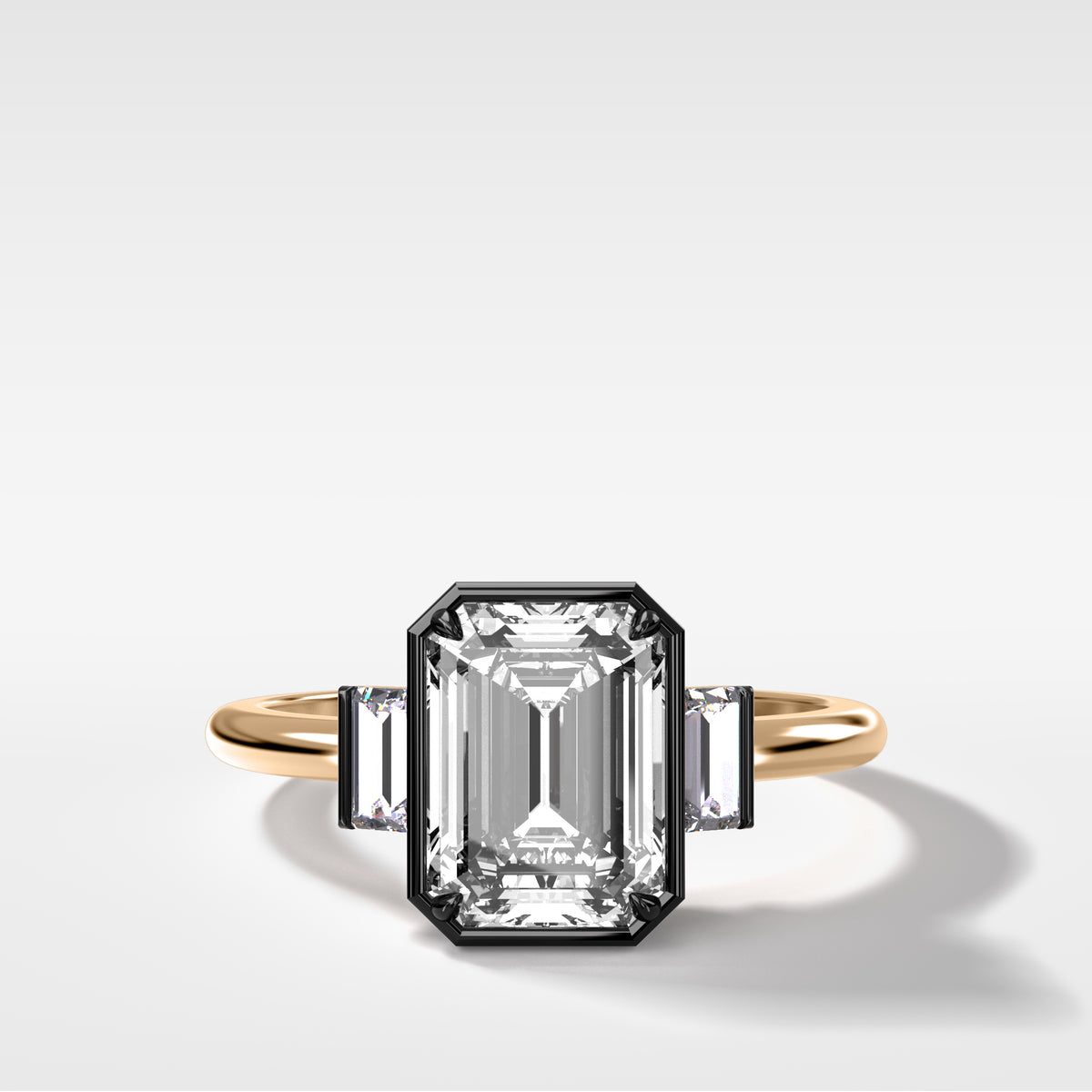 Blackened Three Stone Engagement Ring With Straight Baguette Side Stones and Emerald Cut Diamond