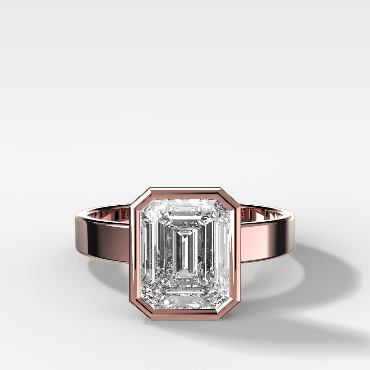 Finest Bezel Set Engagement Ring With Emerald Cut Diamond