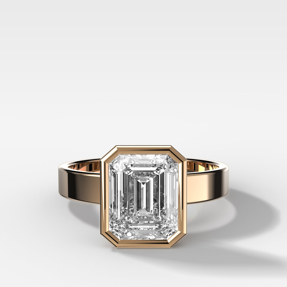 Finest Bezel Set Engagement Ring With Emerald Cut Diamond