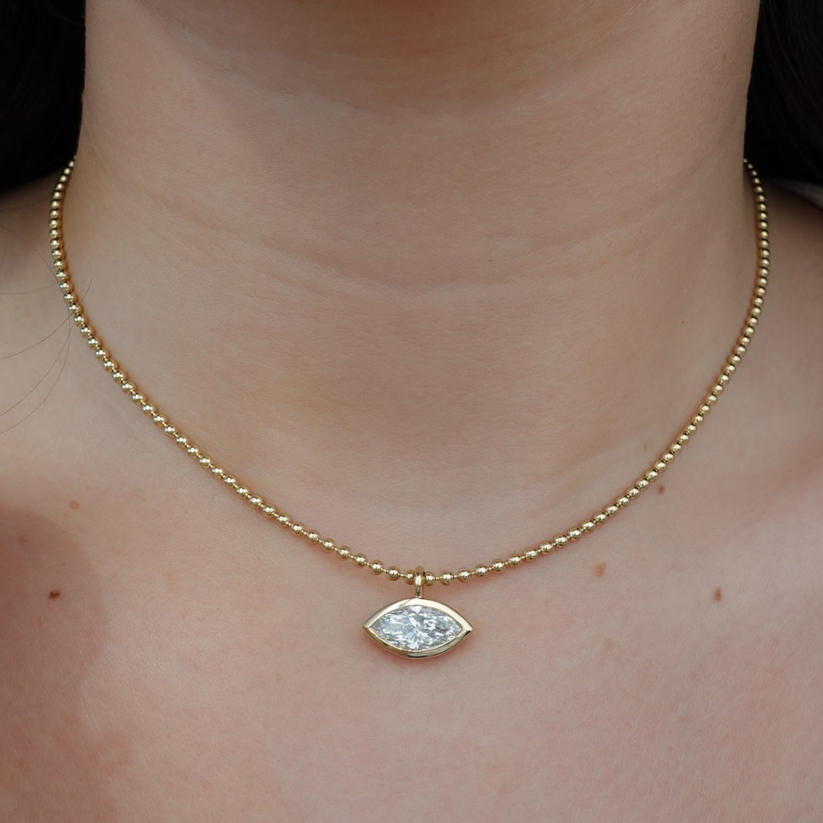 Bezel Set Pendant Beaded Necklace with East West Marquise Cut Diamond