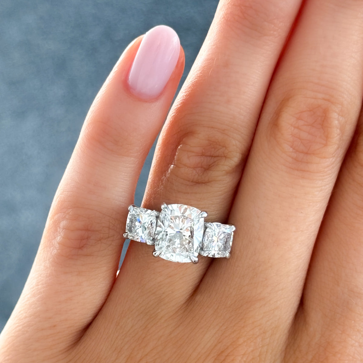 Three Stone Engagement Ring With Mixed Cushion Cut Diamonds