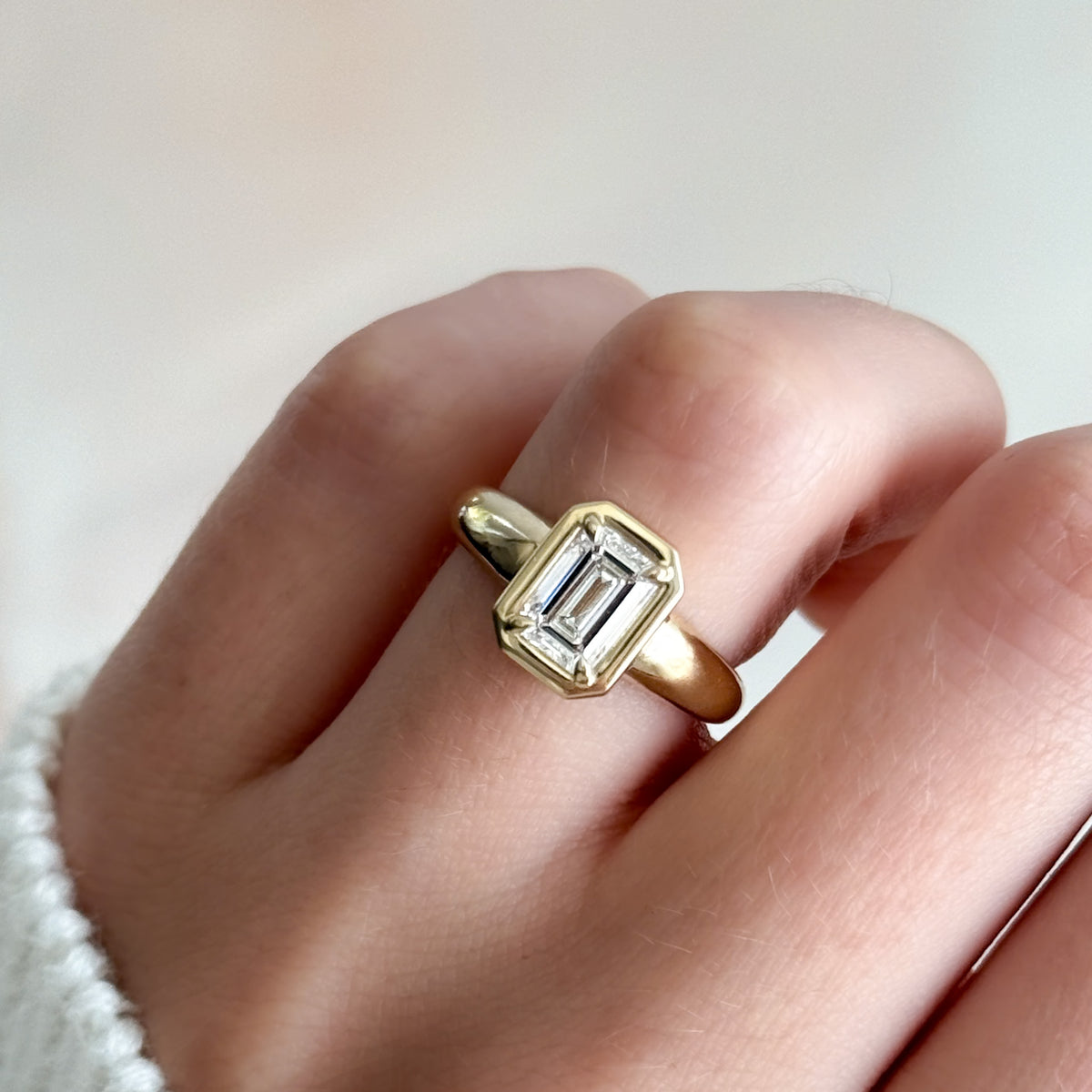 Club Ring Solitaire Engagement Ring With an Emerald Cut Diamond