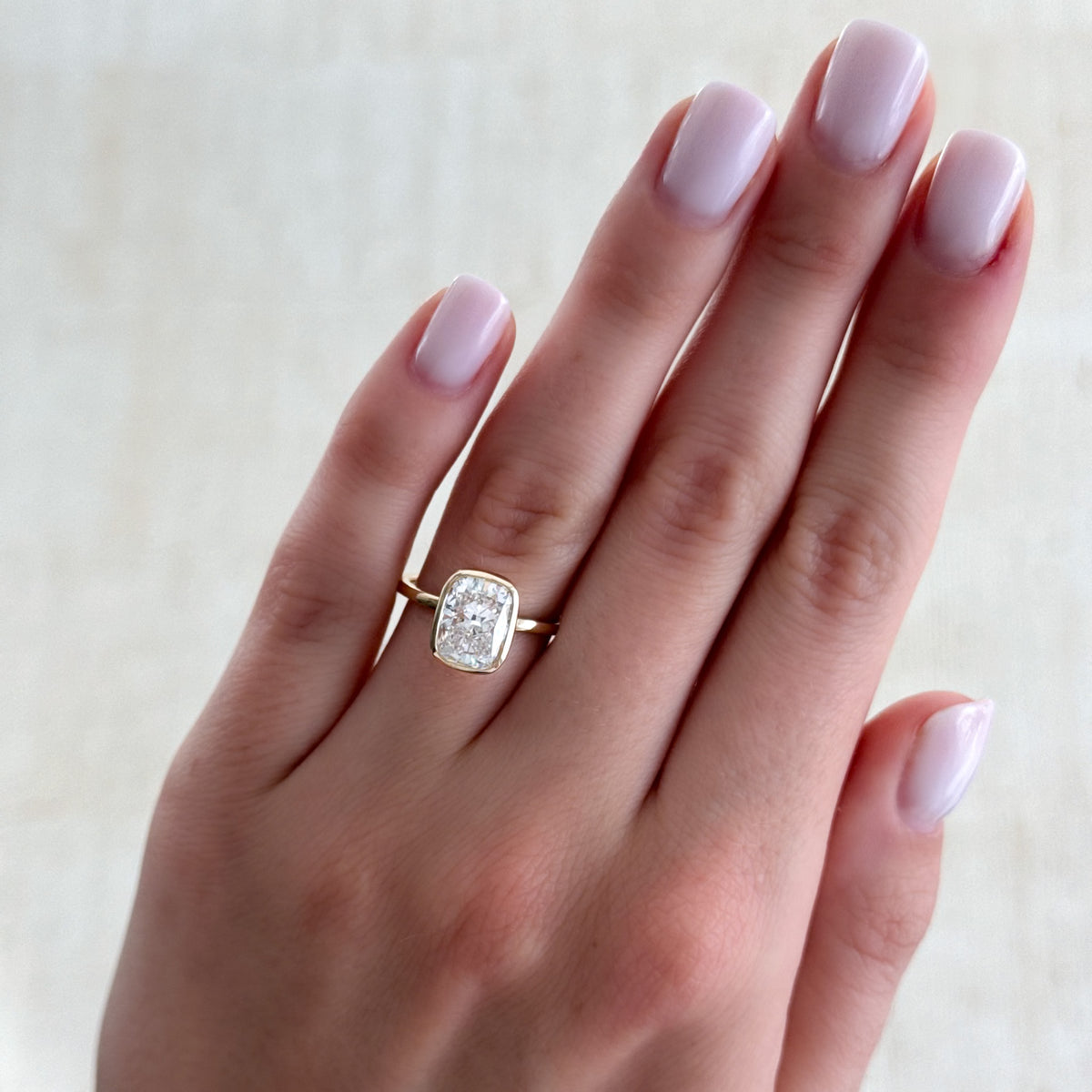 Penumbra Bezel Set Engagement Ring With Elongated Cushion Cut