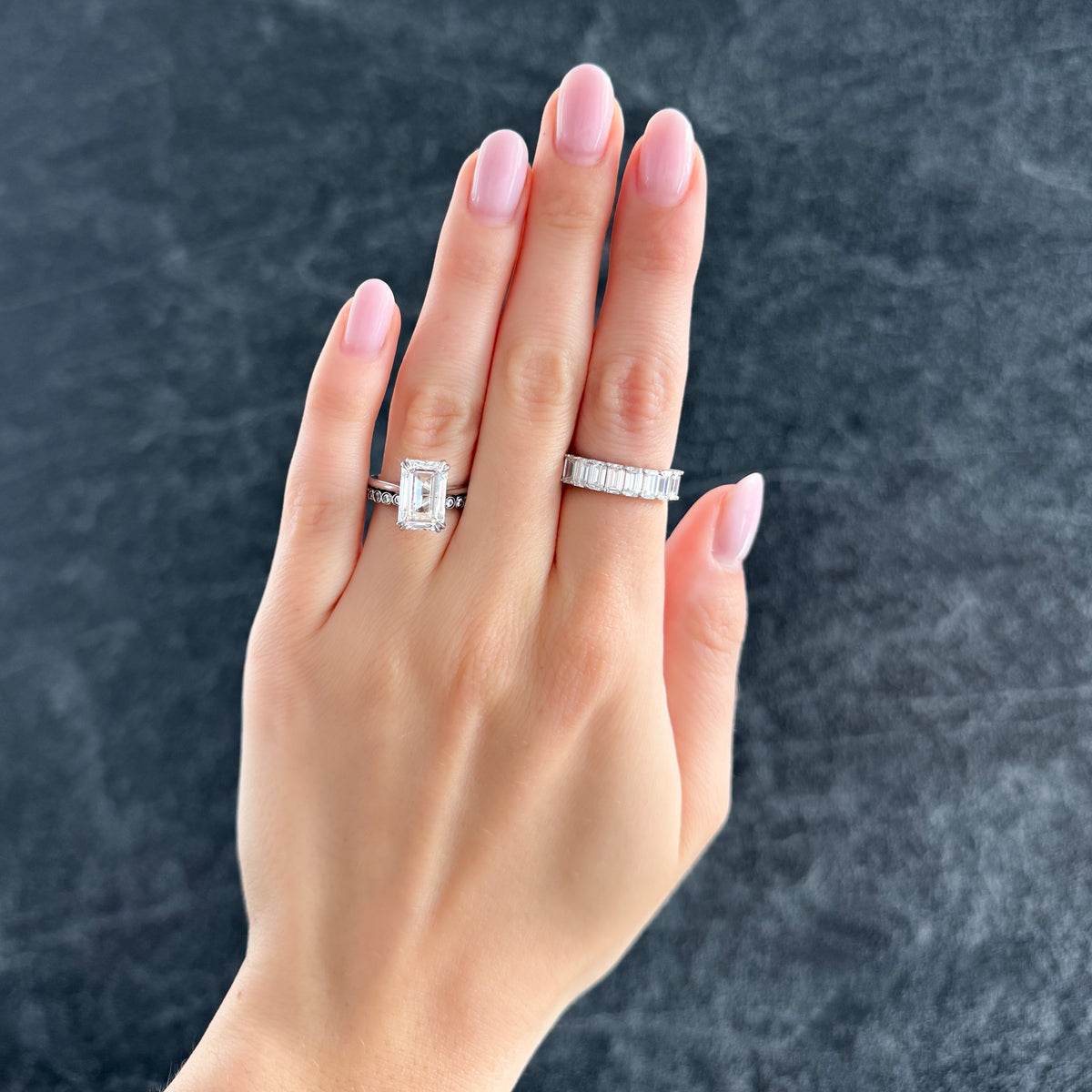 Thin + Simple Solitaire Engagement Ring With North South Emerald Cut Diamond