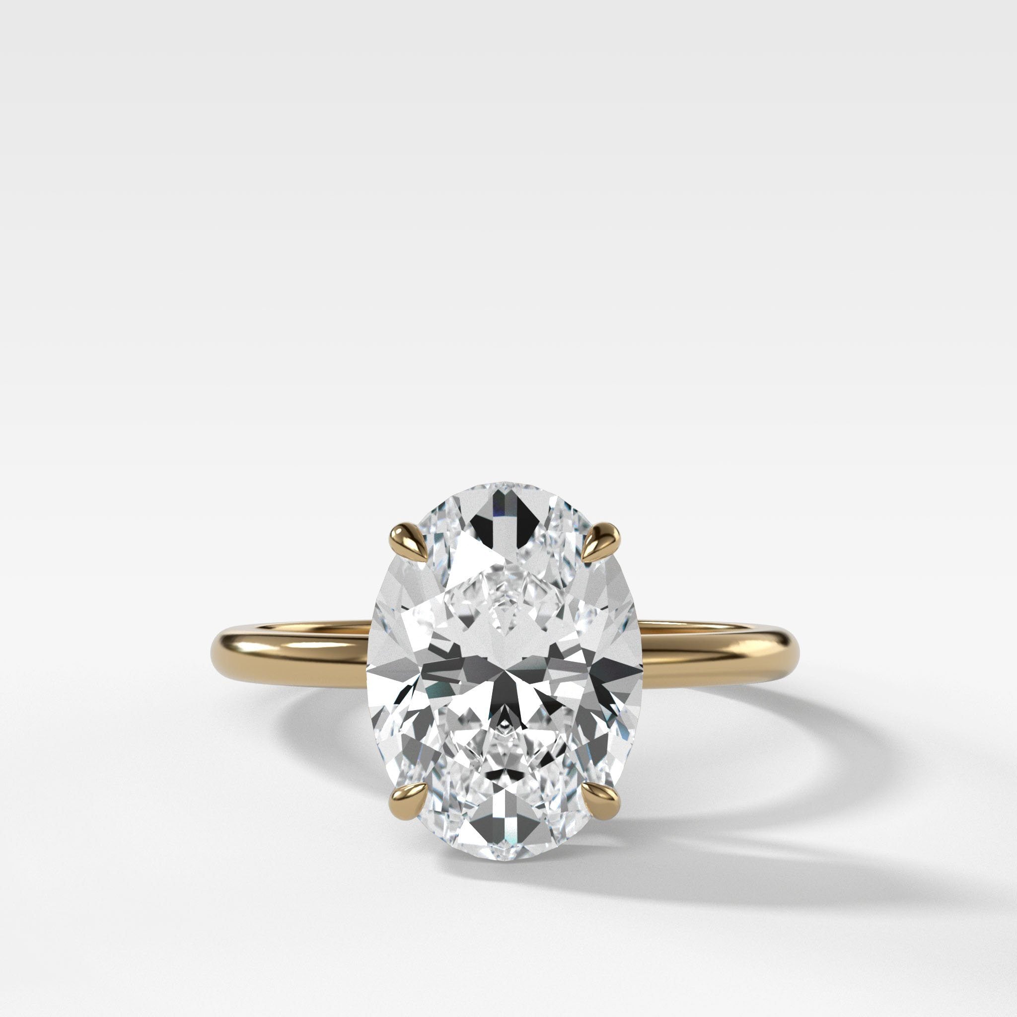 Thin & Simple Solitaire With Oval Cut by Good Stone in Yellow Gold