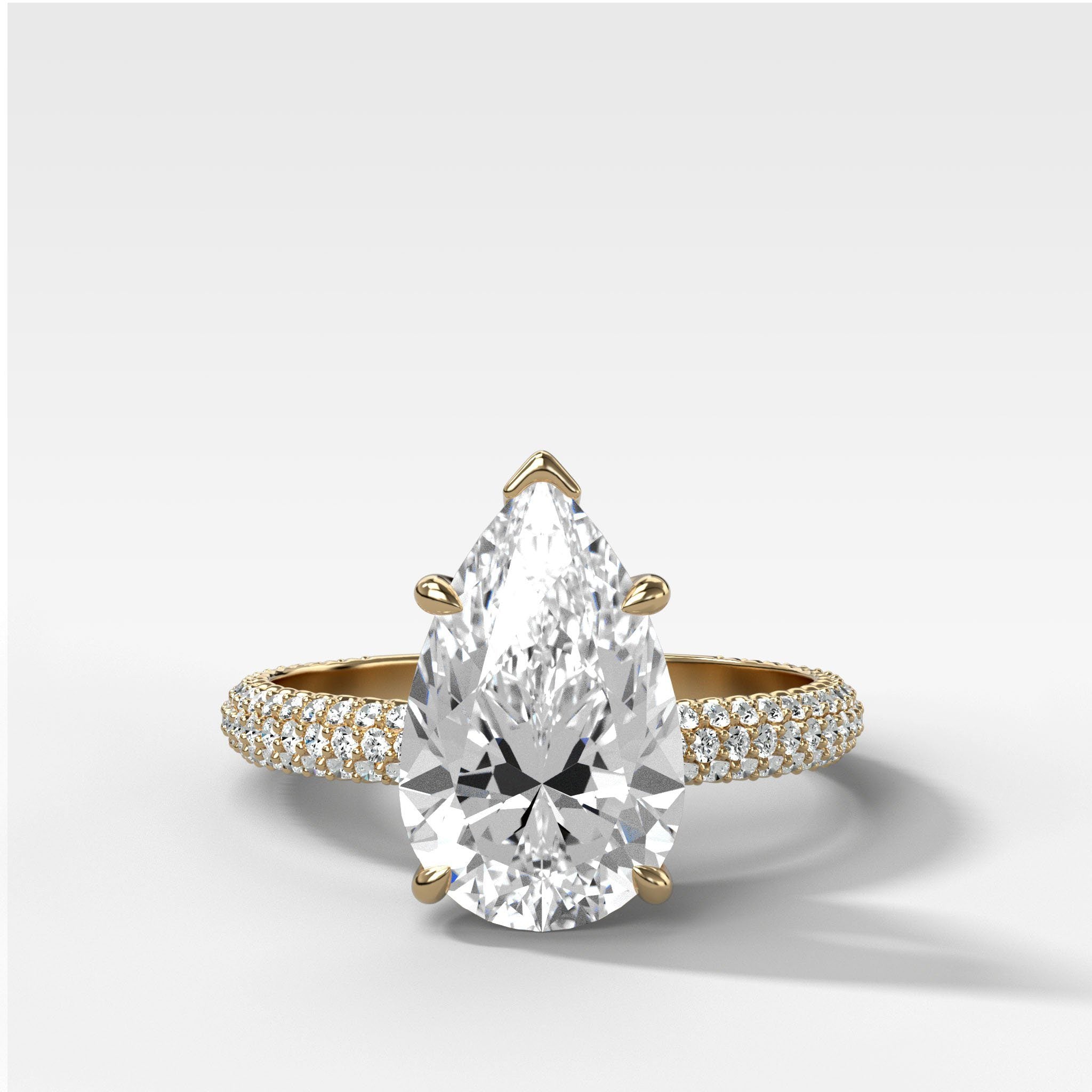 Triple Row Pav≈Ω Engagement Ring With Pear Cut by Good Stone in Yellow Gold