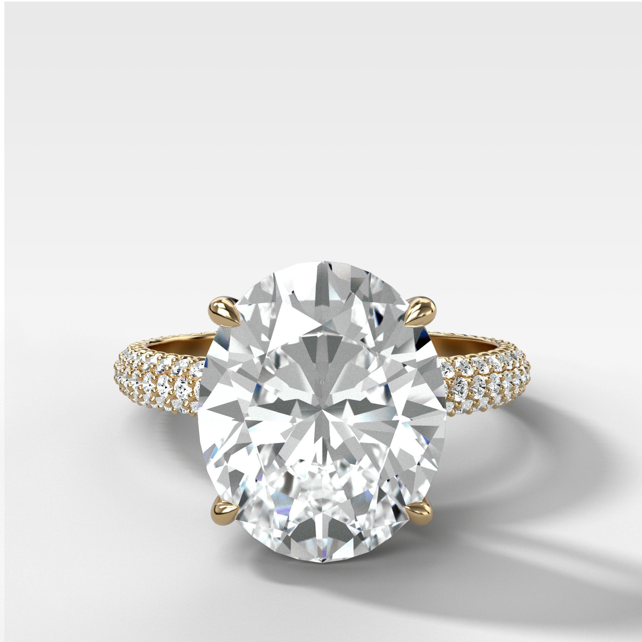 Triple Row Pav≈Ω Engagement Ring With Oval Cut by Good Stone in Yellow Gold