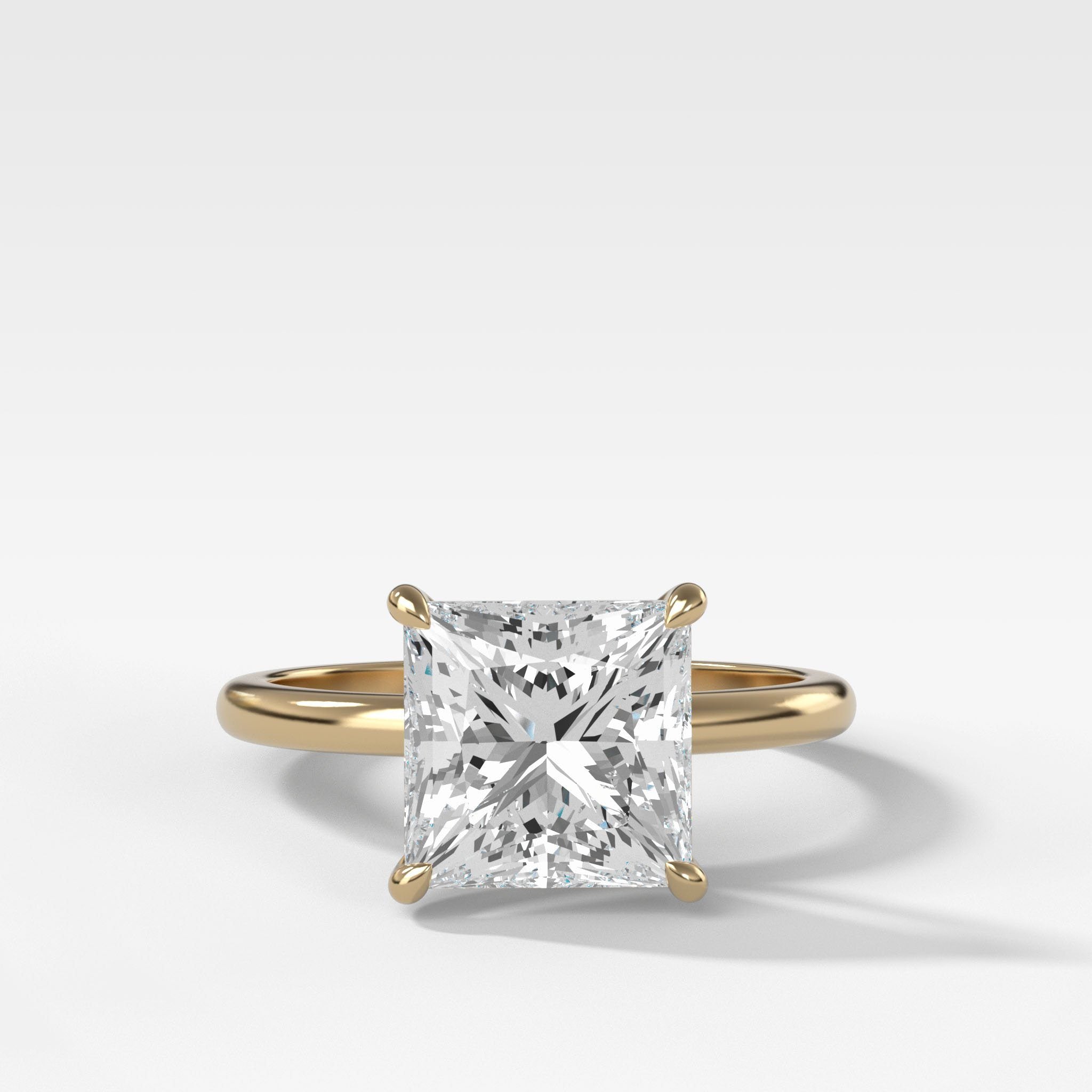 Crescent Solitaire With Princess Cut by Good Stone in Yellow Gold