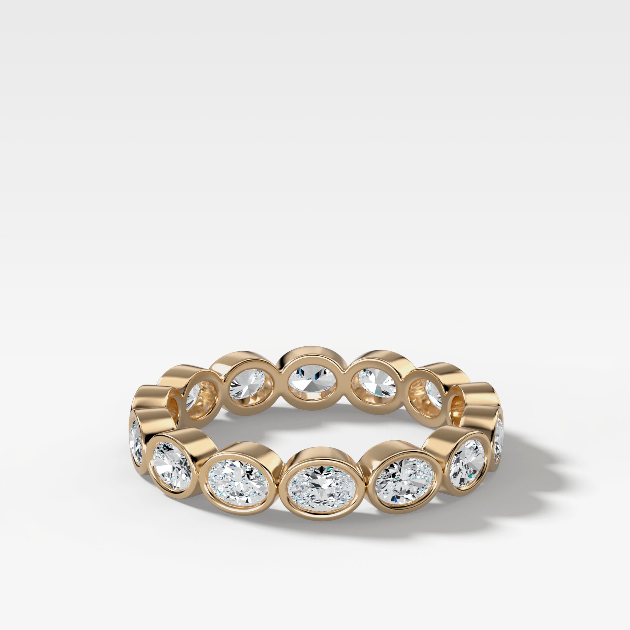 Baby Bezel Set Eternity Band With East West Oval Cuts in Yellow Gold by Good Stone