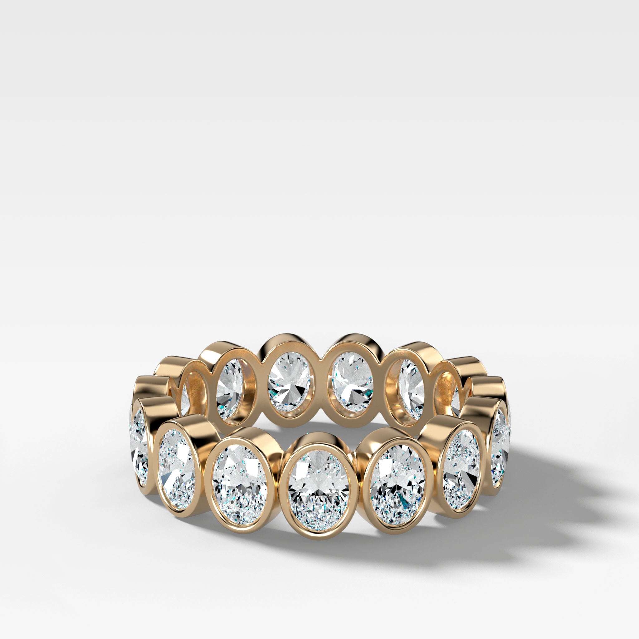 Midi Bezel Set Eternity Band With Oval Cuts in Yellow Gold by Good Stone