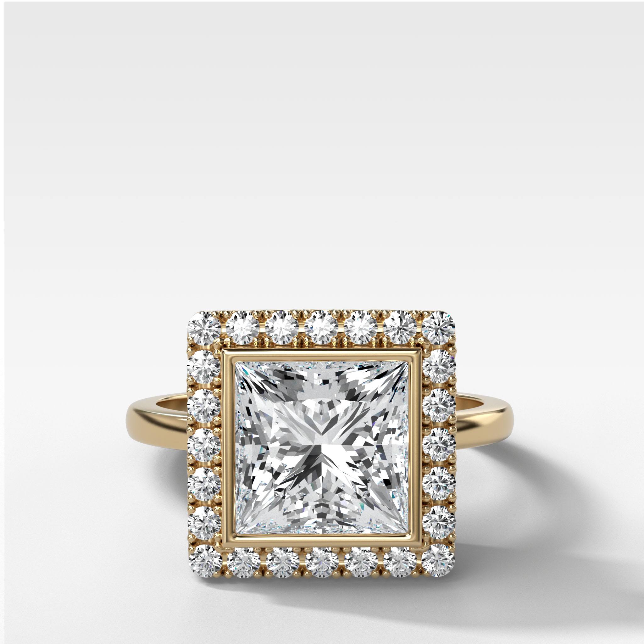 Bezel Set Halo Engagement Ring With Princess Cut by Good Stone in Yellow Gold